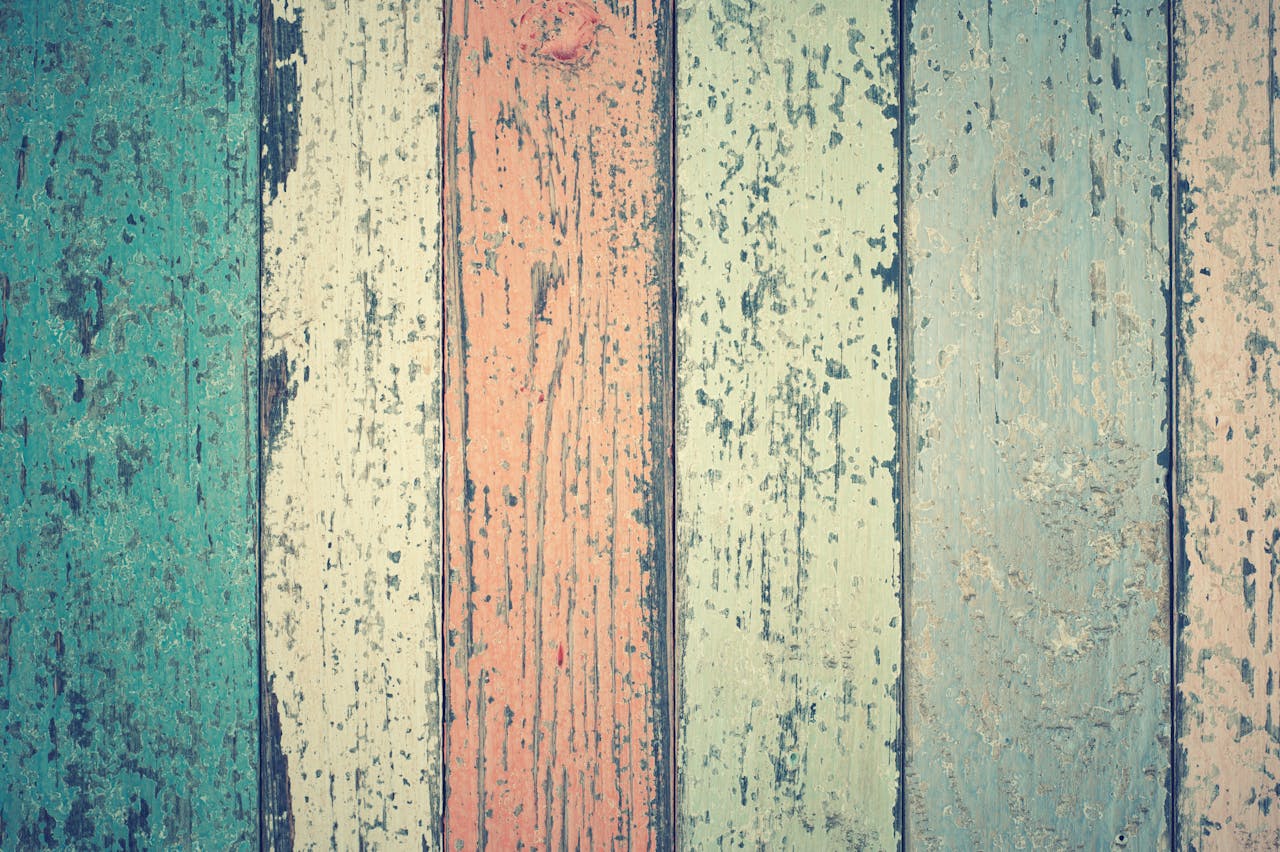 A colorful rustic wooden planks background with a weathered texture and vintage appeal.